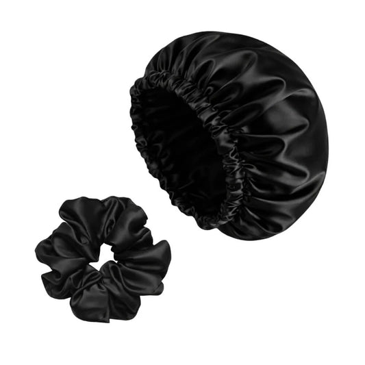 Black satin bonnet and scrunchie set on a white background